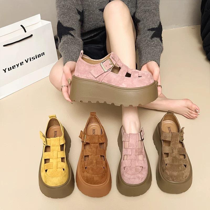 Niche hollow Roman sandals women's summer new muffin thick-soled bag head pig cage shoes British style small leather shoes