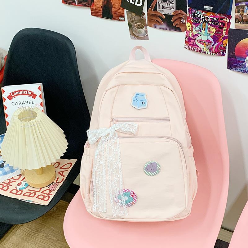 

Высококачественный, свежий и милый рюкзак конфетных цветов, легкий и вместительный рюкзак для учеников средней школы розовый