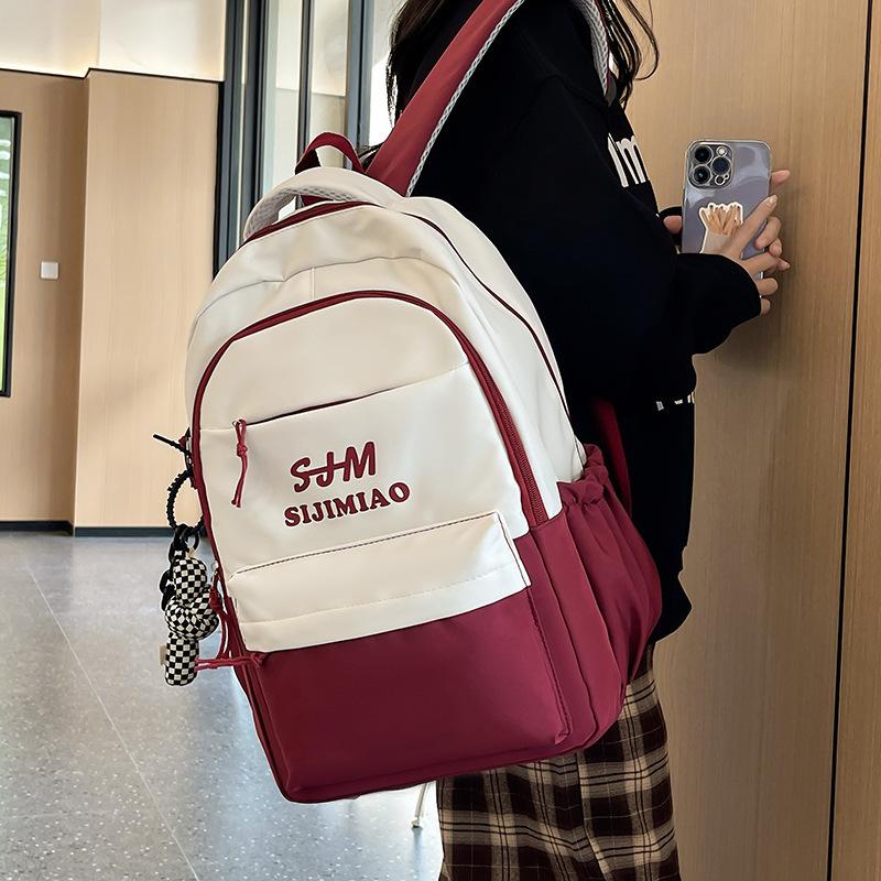 Schoolbag Middle and High School Students Backpack 1011 New Large-capacity Letter Printing Korean Version Contrasting Color Backpack College Backpack