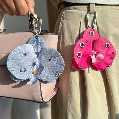 Vynikající klíčenka s orchidejí Phalaenopsis a lilií, kreativní simulační květinový přívěsek na tašku, doplňky na ozdobu batohu, dárky
