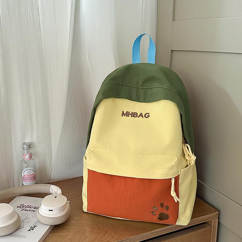 

Fresh and sweet contrasting color splicing backpack junior high school students outing mountaineering large-capacity backpack