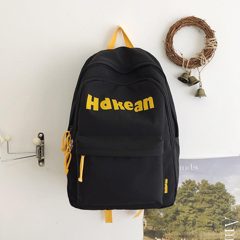 New High-value Solid Color Simple Letter Backpack Couple Casual Lightweight Large-capacity Backpack