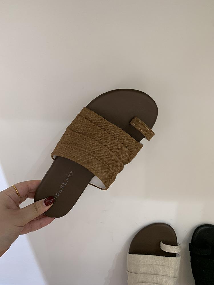 Fashion flat-bottomed pinch Roman slippers women's shoes wear summer cotton and linen sandals sandals design sense one-word slippers women