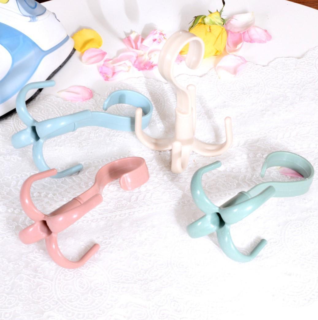 

Поворотний гачок-вішалка з чотирма гачками для капелюхів, пальто, сумок та шарфів