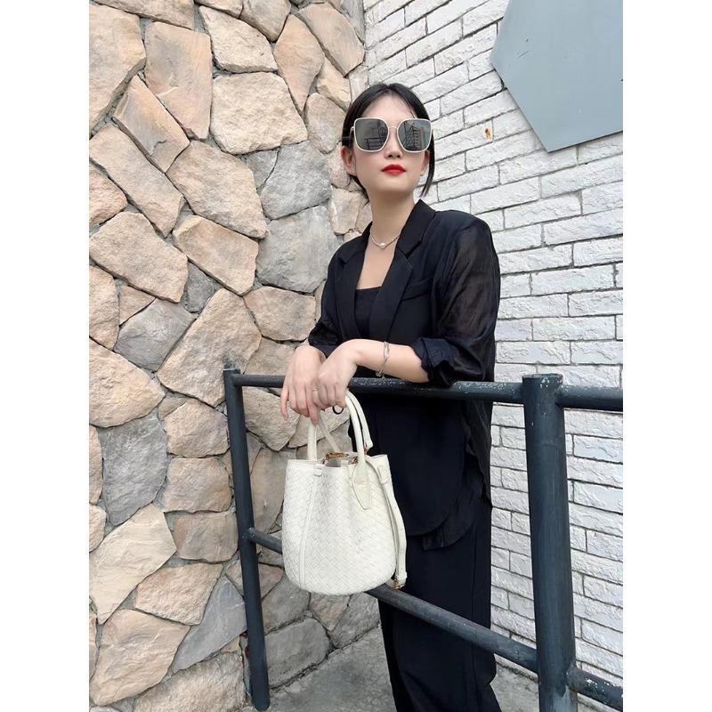 New woven bucket bag leather women's fashion portable messenger bag child and mother bag niche design portable