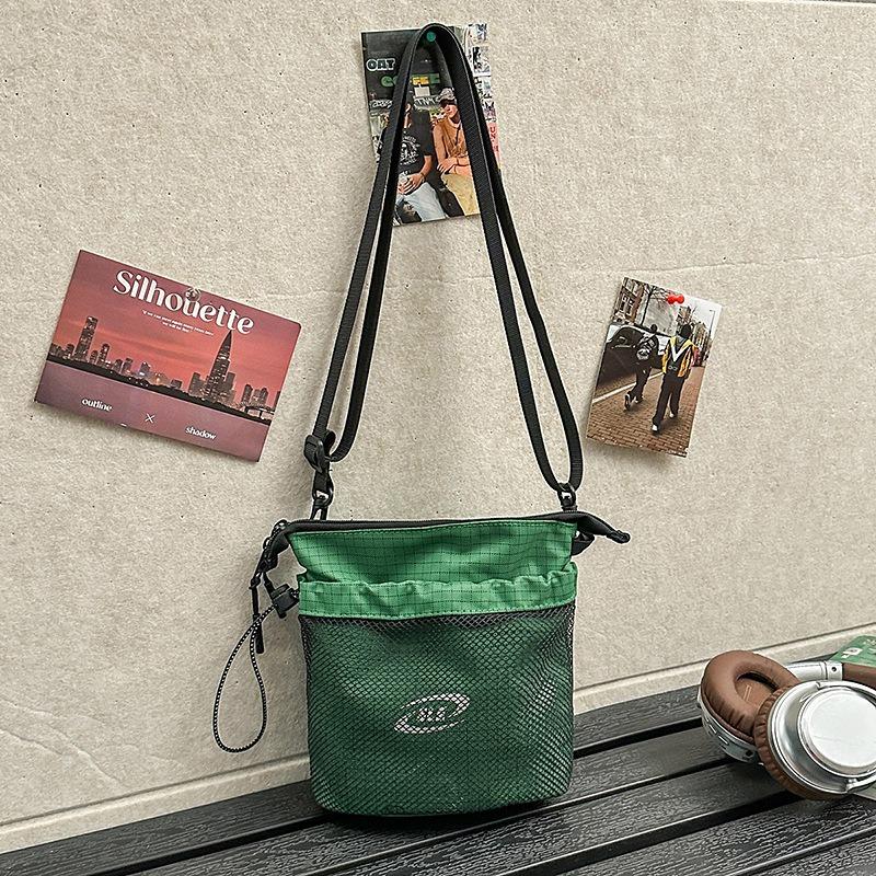 Casual messenger bag new fashion versatile commuter sports bucket shoulder bag women's mobile phone bag