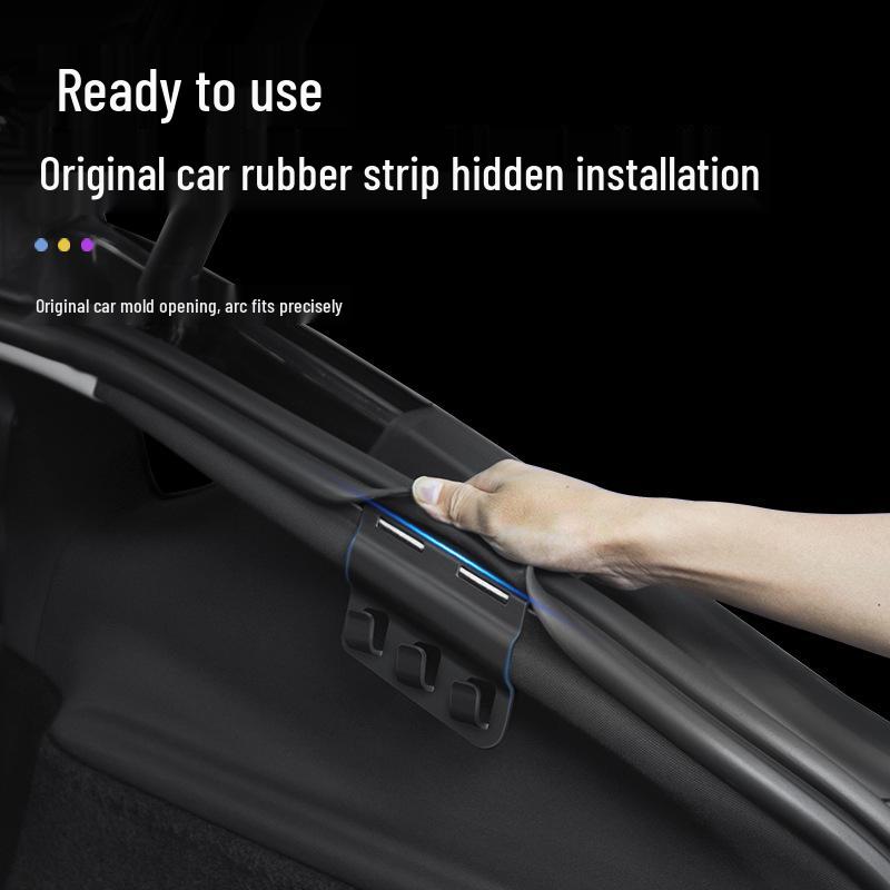 Háčky pro zavěšení v kufru a boční úložné háčky Tesla Model Y