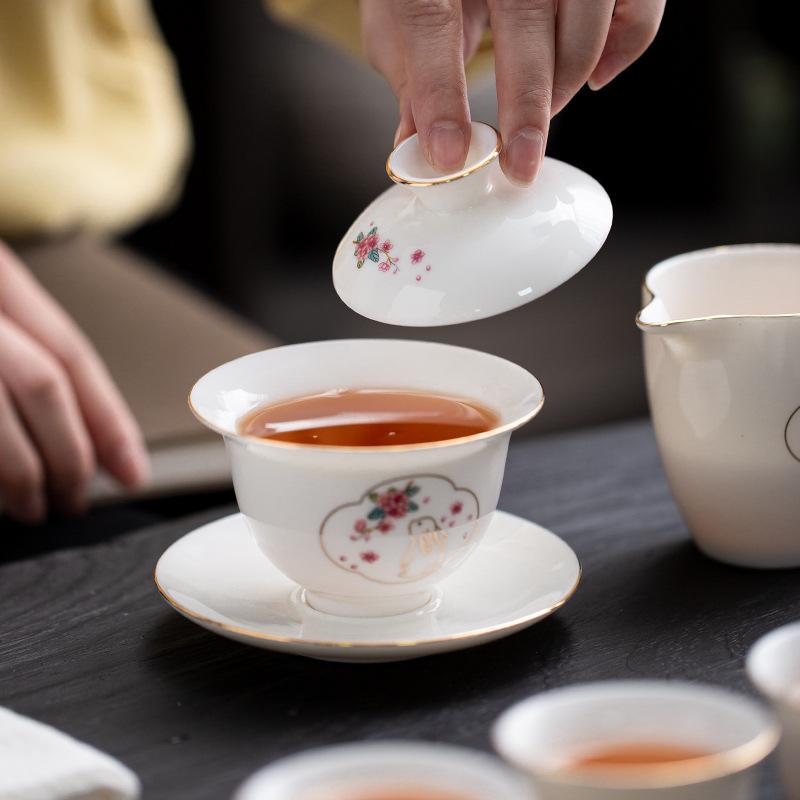 The company's annual meeting opens with gifts, Dehua suet jade porcelain tea set, and a complete set of boutique gift boxes will be sent to customers.