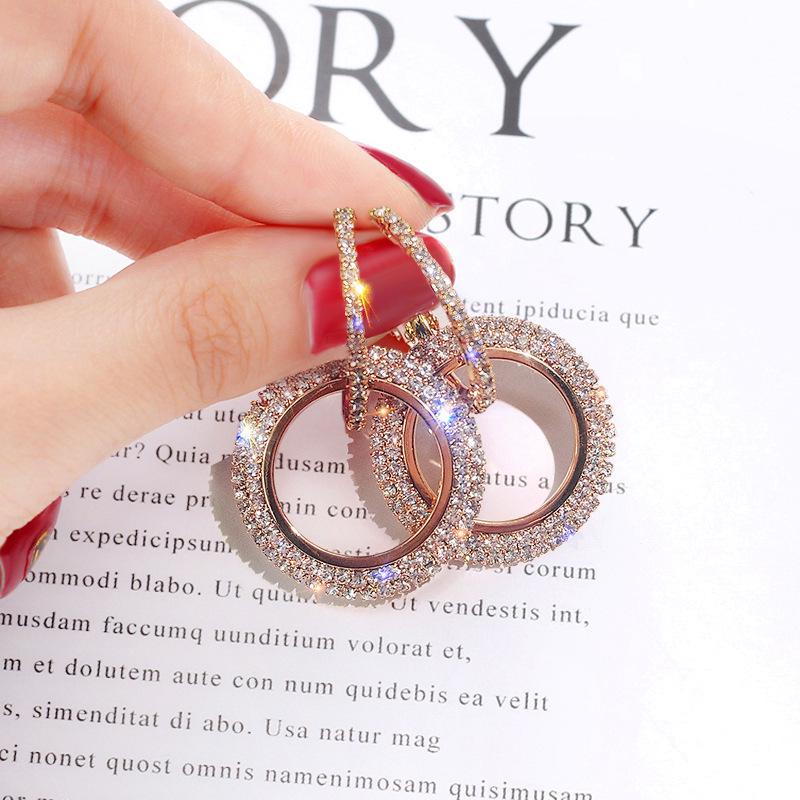 

Korean version of the new fashion with diamond earrings for women, diamond-set geometric circle studs, European and American