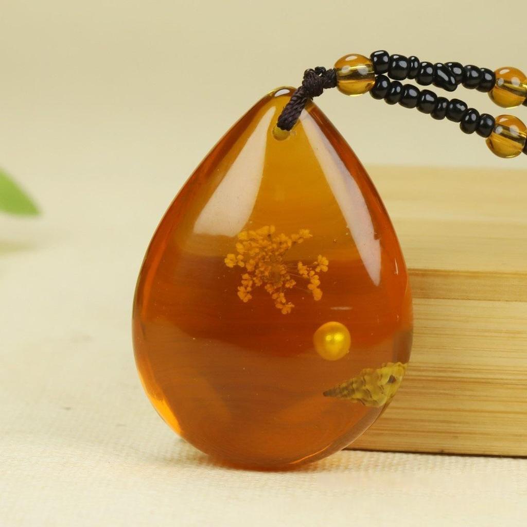 Elegant Translucent Conch Flower Pearl Water Drop Pendant - New Chinese Style.