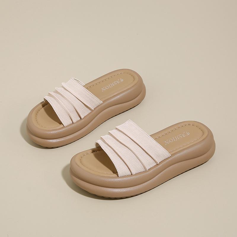 Muffin thick-soled one-word cool slippers outer wear women's shoes 2025 new spring and summer beach casual versatile cool slippers