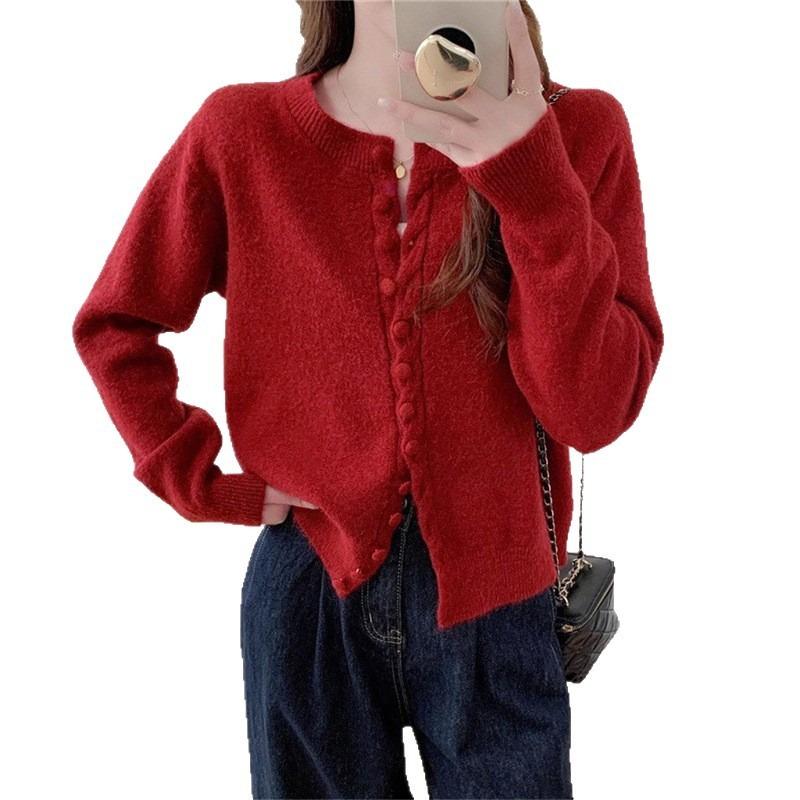 Autumn new solid color round neck single-breasted splicing long-sleeved knitted sweater women's fashion age-reducing top