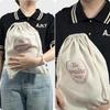 A reusable linen bread storage bag - an unbleached drawstring bag for the natural storage of homemade bread and pastries