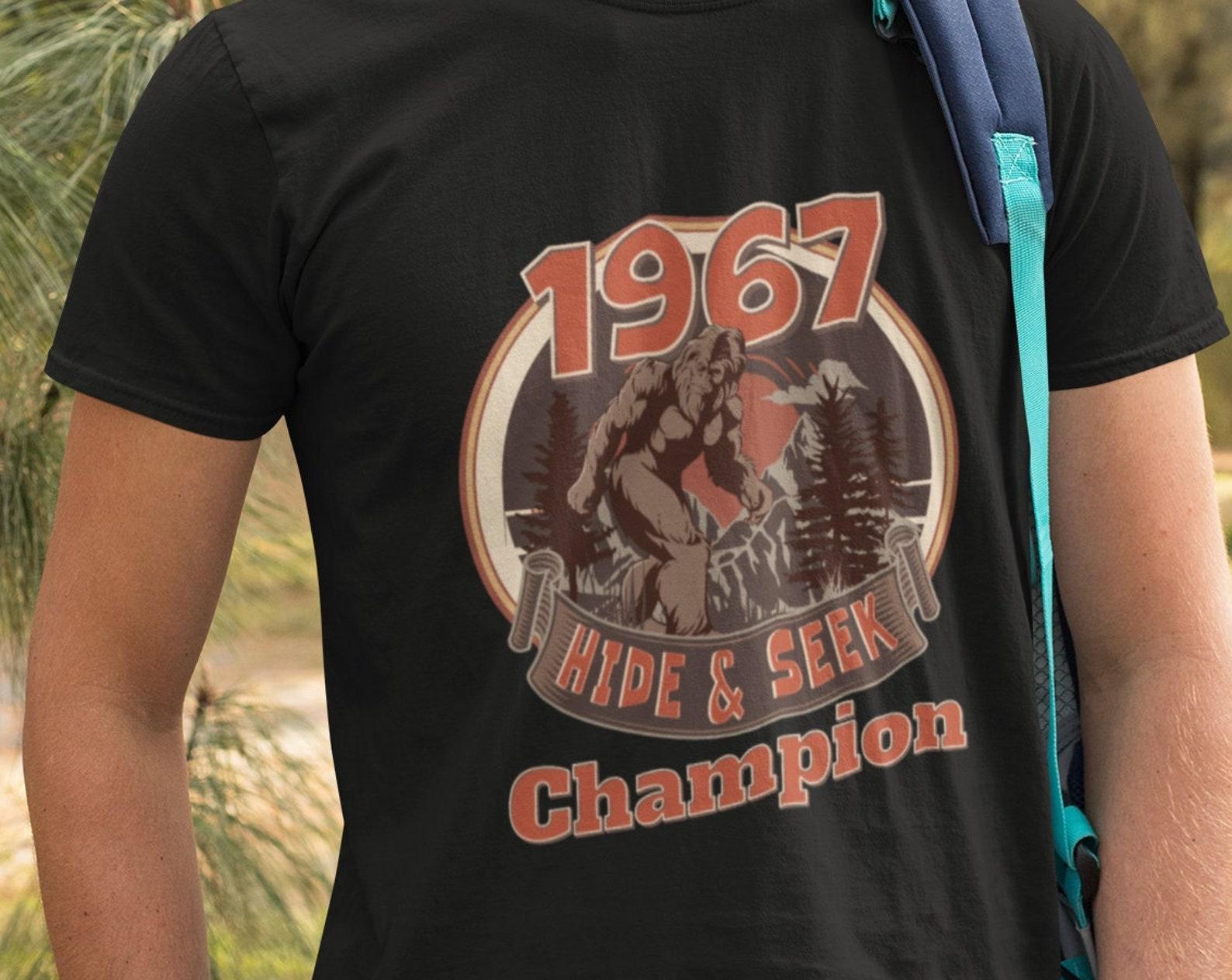 1967 Big Foot Hide and Seek Champion | Hiking Tshirt | Great for the Hiker/Backpacker | 2Merchants 4XL