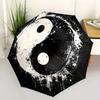 Automatic Folding Umbrella Yin-yang symbol with paint splatter effect. Portable collapsible design, casual outdoor accessory,