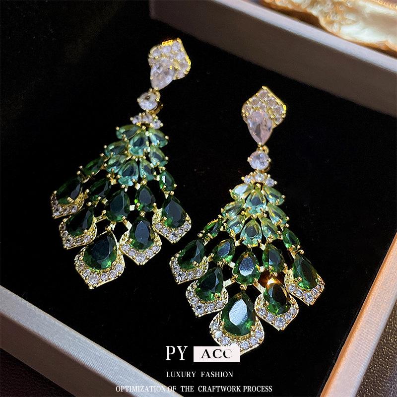 Silver Needle Cubic Zirconia Feather Dangle Earrings - Retro High-End Style, Niche Exaggerated Design for Women.