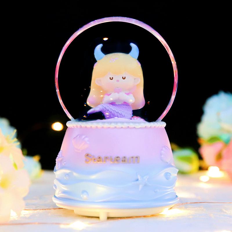 Adorno de Bola de Cristal Musical de Astronauta Nevado