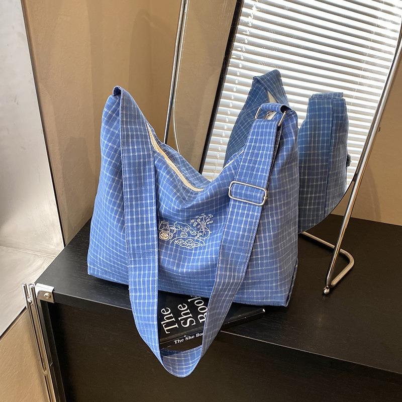 Simple canvas bucket bag women's spring and summer new fashionable versatile plaid large-capacity shoulder bag