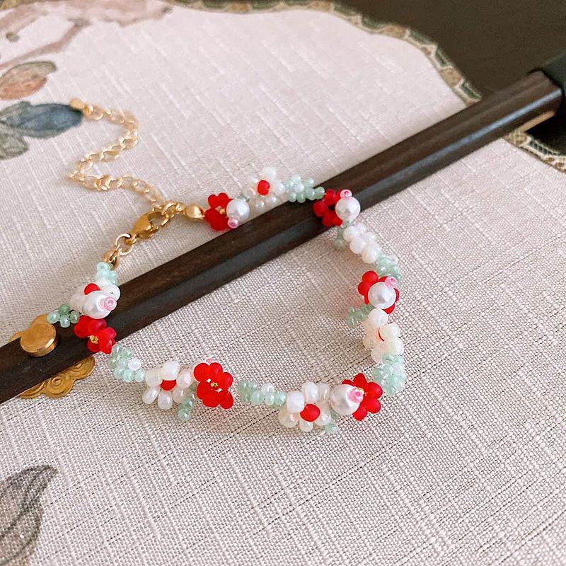 Small fresh flower rice bead pearl bracelet female sweet girl heart bracelet niche simple high-end jewelry