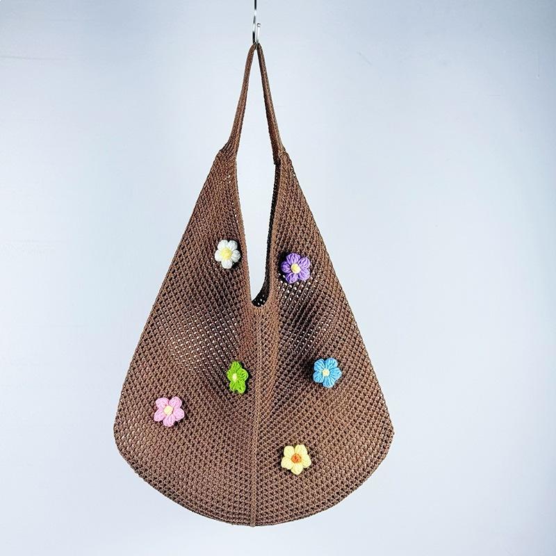 Beach bag single shoulder tote bag women's hollow new Korean version knitted woven bag flower lazy wind
