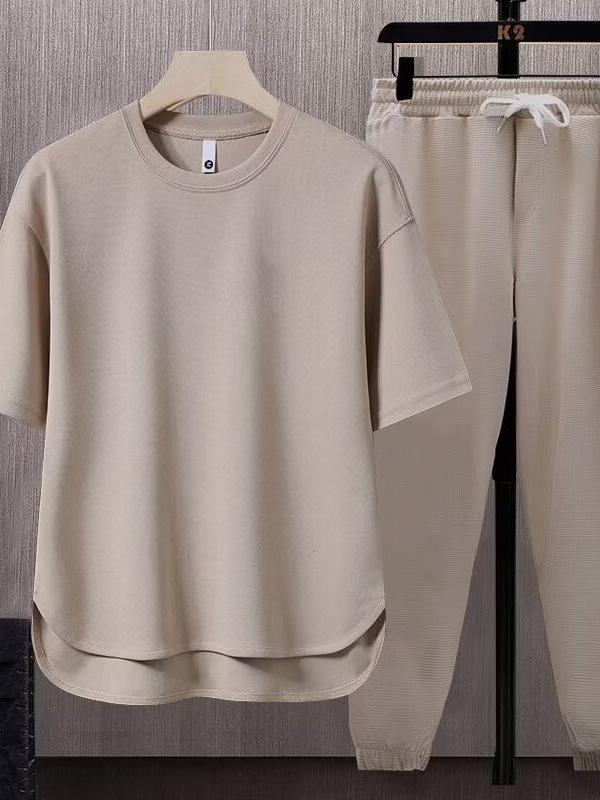 Set da uomo a due pezzi tinta unita tendenza giapponese: T-shirt a maniche corte e pantaloni lunghi (Estate 2025)