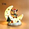 Holiday Party Supplies Christmas Moon Night Light with Santa Claus, Resin Decoration Warm LED Atmosphere Lighting Glow, Tabletop Ornament for