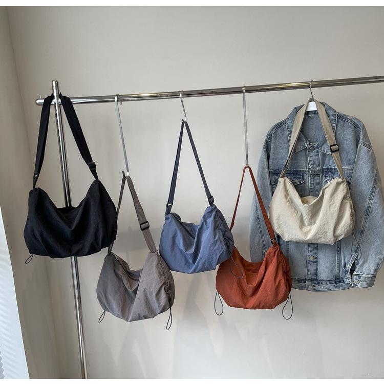 Simple Solid Color Nylon Crossbody Bag Pleated Drawstring Design Cloud Bag Lightweight and Versatile Commuter Shoulder Dumpling Bag