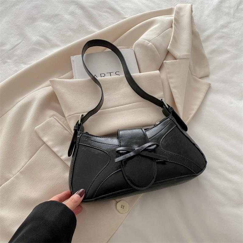 Silver small underarm bag women's 2025 new summer high-end French niche design baguette shoulder bag