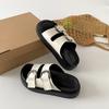 Fashion trend black thick-soled one-word slippers women's summer wear 2025 new high-end height-enhancing cool slippers