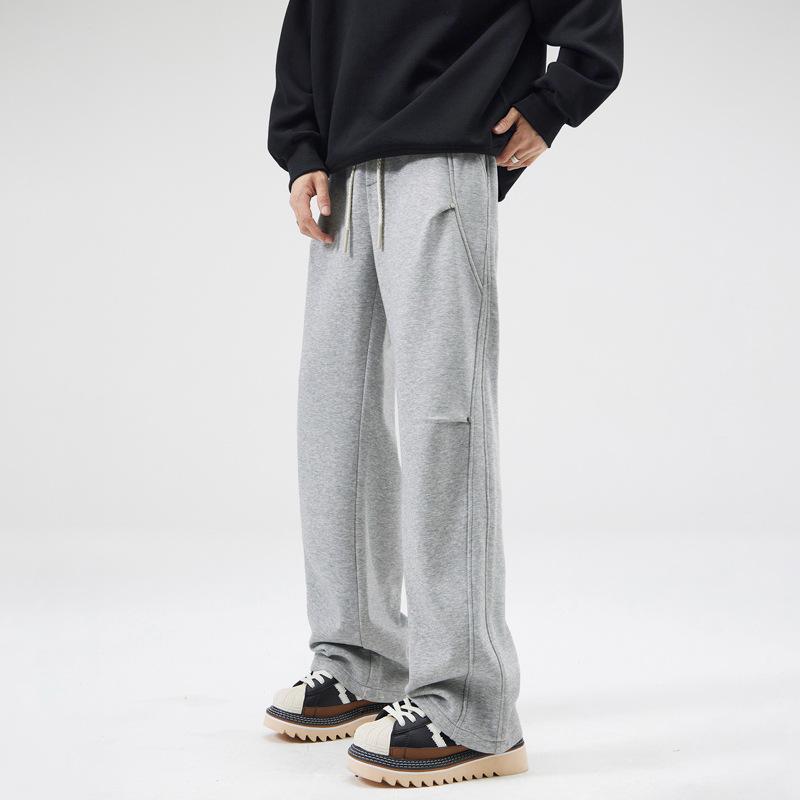 | Autumn and winter new double knee rivets irregular splicing design sweatpants American trendy brand loose drape pants