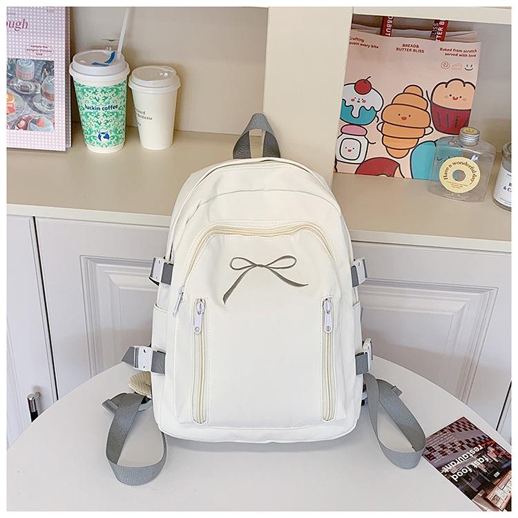 School bag cute Korean version versatile junior high school students casual simple solid color bow back