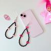 Black beaded ribbon phone strap