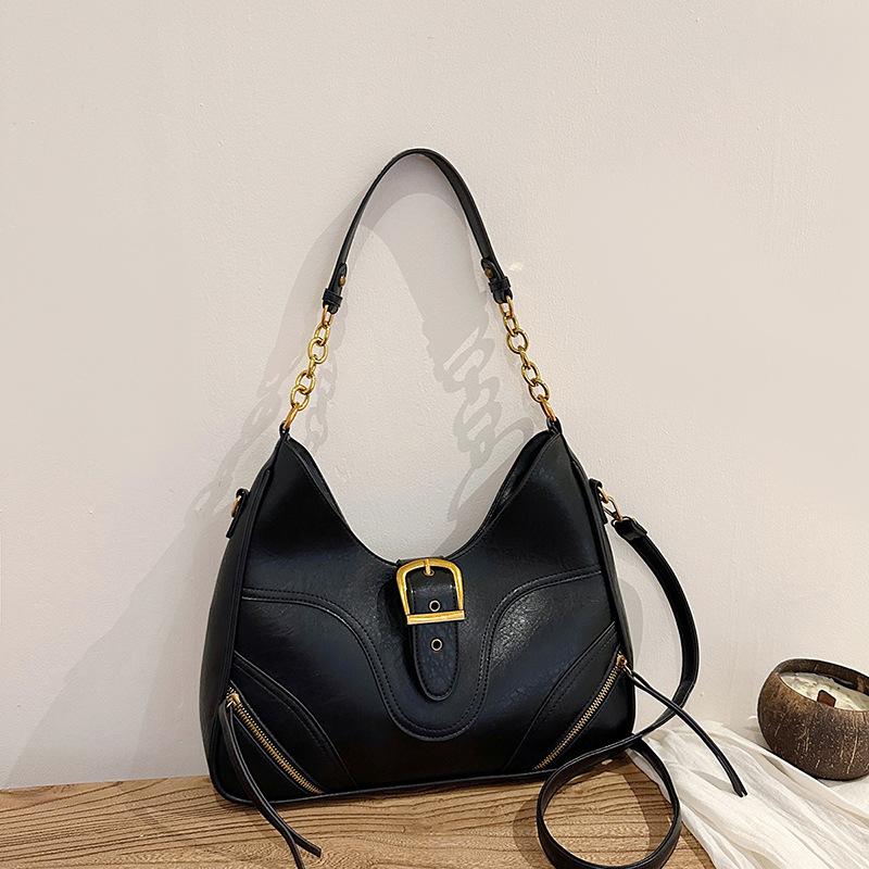 Зимняя ретро сумка-багет высокого класса для通勤 под мышкой женская 2025 новая простая наплечная сумка-тоут универсальная сумка кроссбоди