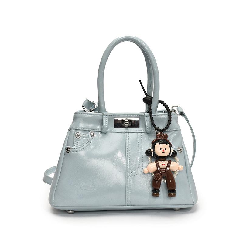 Spring and Summer New French Fashion Commuter Style Portable Bucket Bag Women's Versatile High-quality Foreign Leisure Messenger Bag