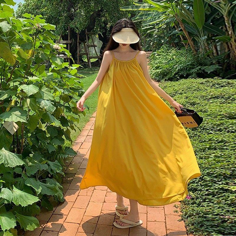 Hainan Sanya vacation beach dress sexy loose backless dress Xishuangbanna suspender design long dress summer