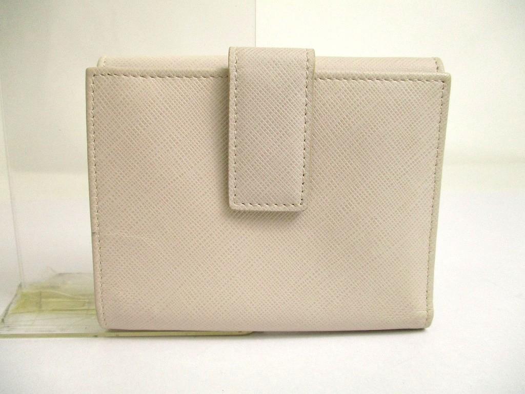 Autentisk Salvatore Ferragamo Gancini lysbeige skinn sølvfarget H/W bifold-lommebok #a701 pusset opp