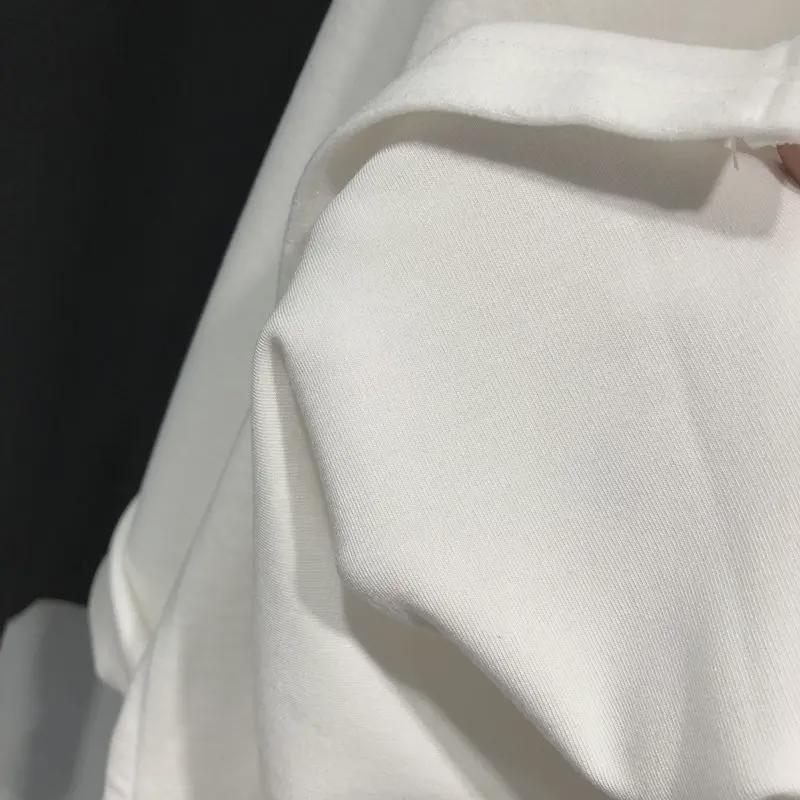 Top holgado de manga larga con escote en V y abertura media para mujer (otoño 2023)