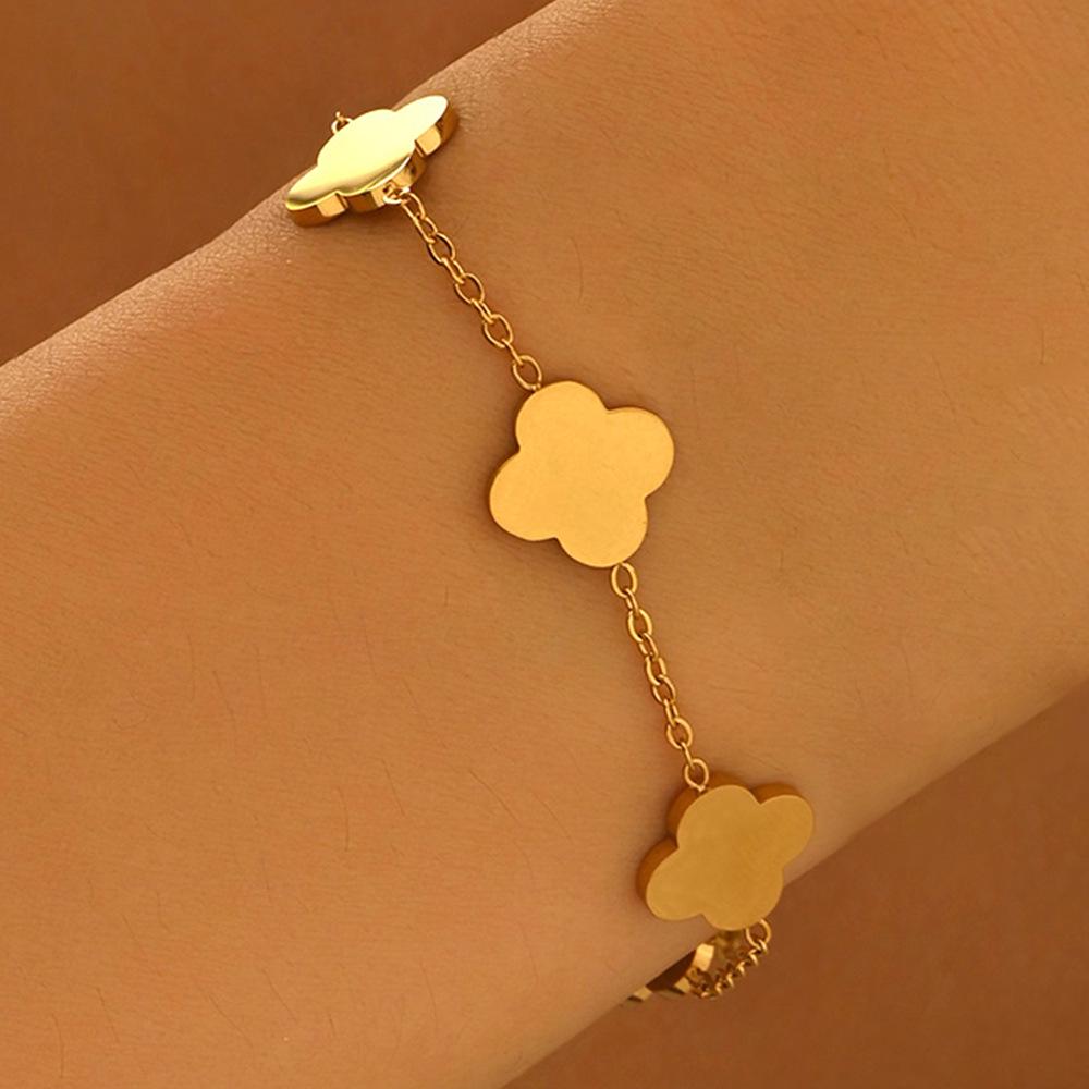 Edelstahl Damen Armband Schmuck mit Zirkonium & Titan Kleeblatt.