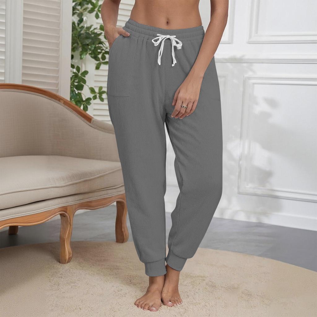 Women's Fashion Solid Color Elastic Waist Pocket Strap Foot Strap Casual Pants