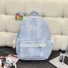 Simple casual striped schoolbag Female junior high school student backpack Large capacity class commuter travel backpack