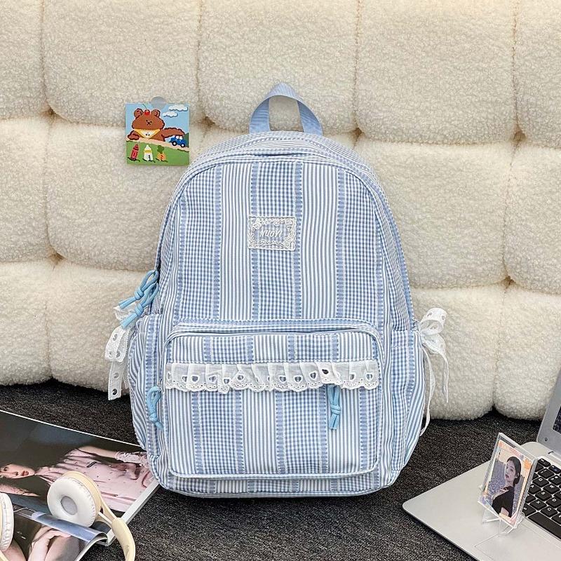 Simple casual striped schoolbag Female junior high school student backpack Large capacity class commuter travel backpack