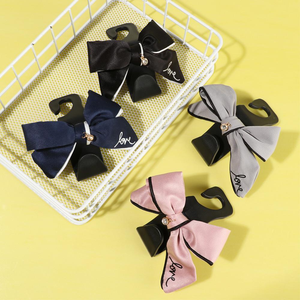Cute Safety Seat Hooks Vehicle Head Holder Organizer Grocery Hanger Bag Car Interior Accessories Bow Hook Storage