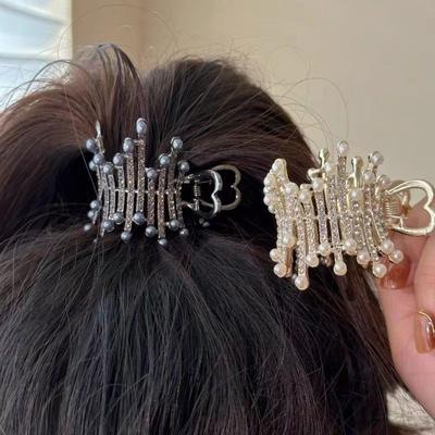 Piccoli fermagli per capelli con perle di strass squisiti Dichiarazione geometrica Fermagli per artigli per capelli a forma di stella Fermagli per capelli per donne Accessori per capelli in metallo