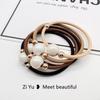 Pearl Hair Tie: Women's Elastic Leather-Covered Hair Ring