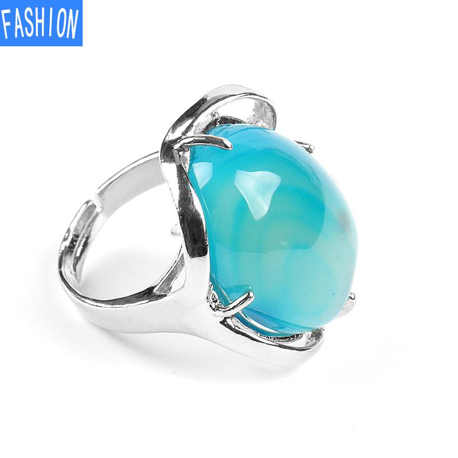 Natürlicher ovaler Kristallring mit vier Krallen