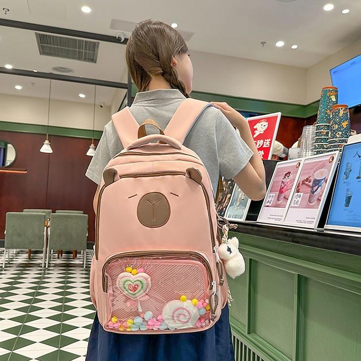 School bag female new cute ugly cute cartoon pain layer backpack high value primary and secondary school students large capacity backpack male