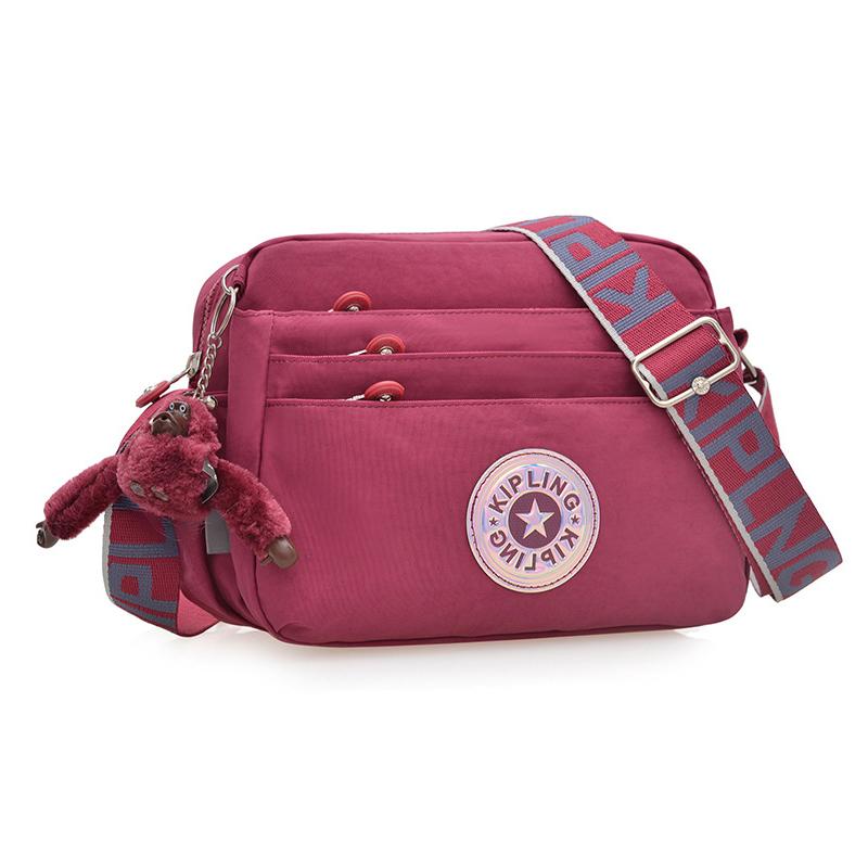 Nylon Waterproof Large Crossbody Bag Shoulder Bag Messenger Bag With Monkey Pendant Doll