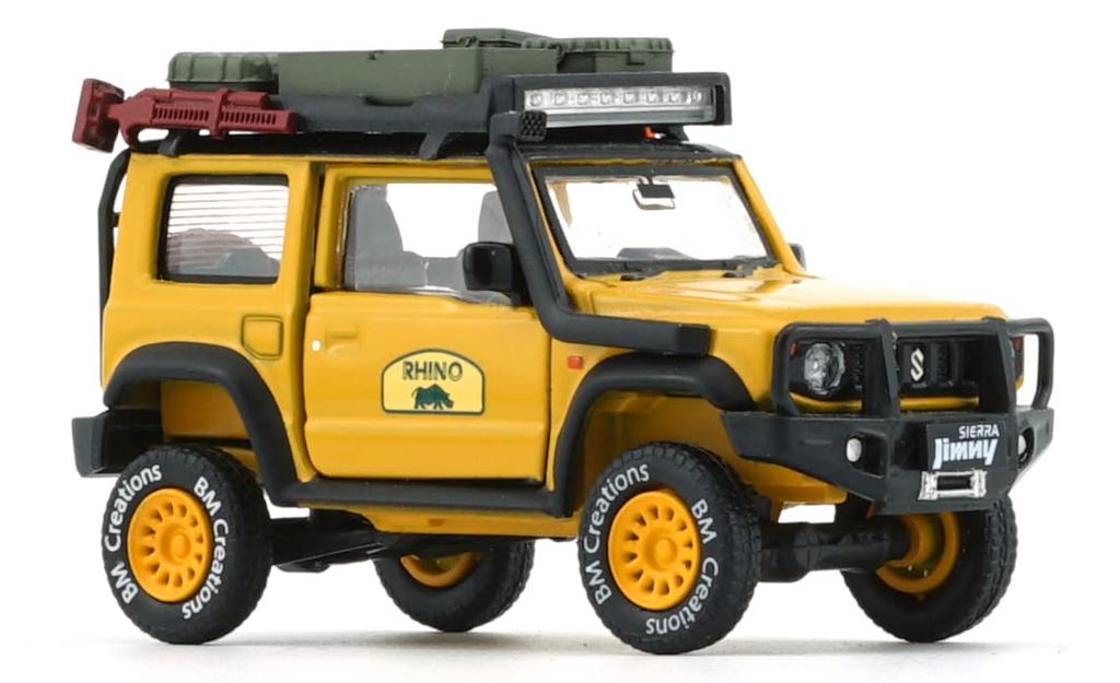 Scherer Designs BM CREATIONS Měřítko Suzuki Jimny 2019 RHD Rhino Slonová kost Žlutá Balíček příslušenství BMC X JIMNY 5. výročí Hotový model 1/64 (JB74)