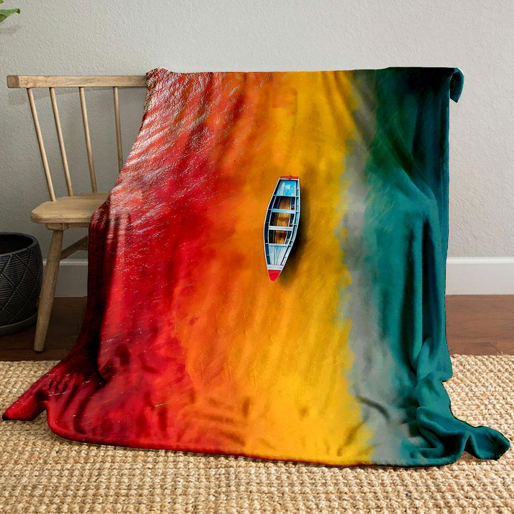 A boat floats atop vibrant red, yellow, and teal water gradients transitioning. for all seasons blanket lunch break throw gift