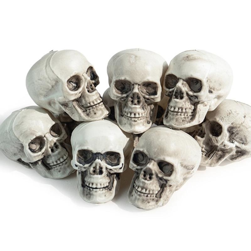 Plastic Mini Skulls for Repeat Use, 10-Piece Halloween Decoration Set That Rinses with Water for Tables, Shelves, and Seasonal Displays